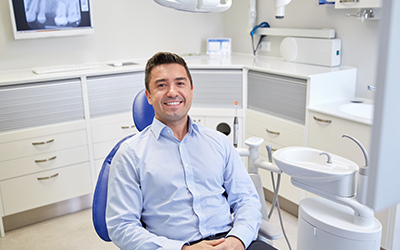 Man sitting in periodontal office